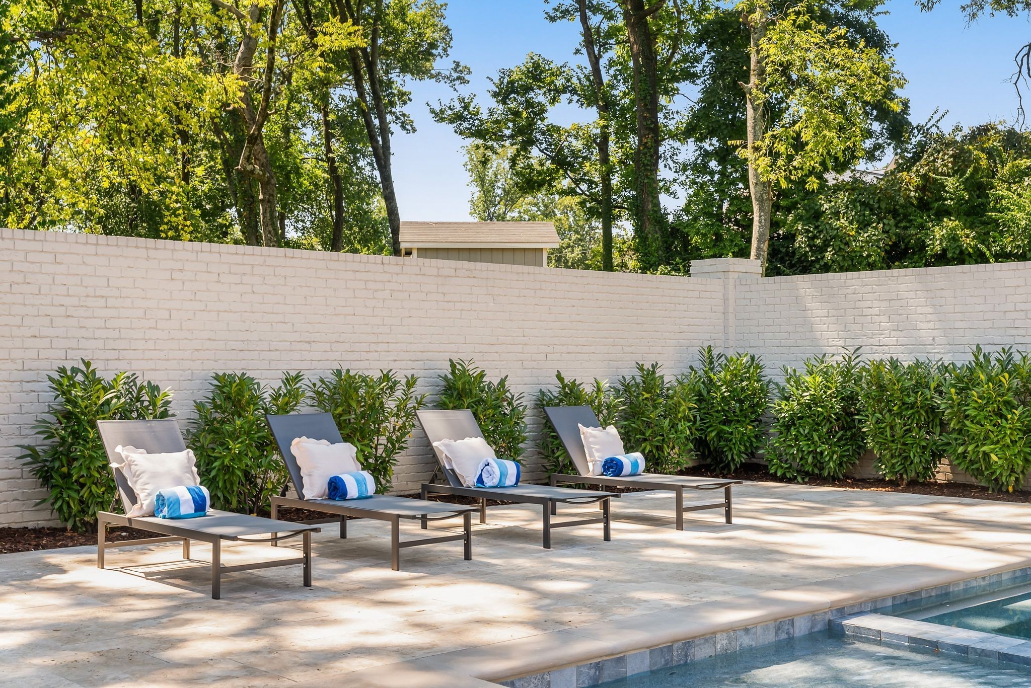 4301 Estes Road Nashville, TN 37215 - Photo 58 of 65 a bench sitting in a backyard of a house