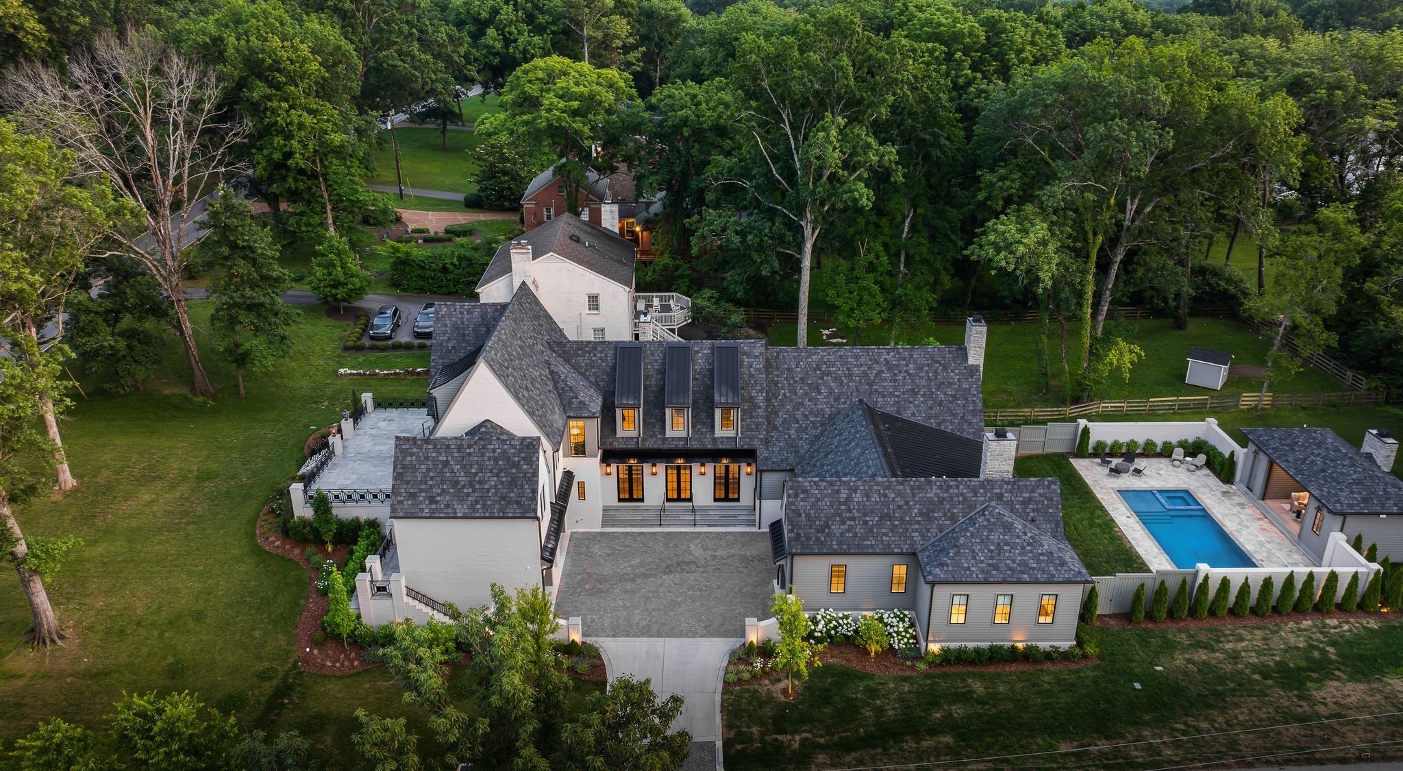 4301 Estes Road Nashville, TN 37215 - Photo 63 of 65 a aerial view of a house with swimming pool garden and patio