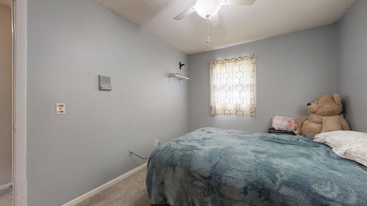 3656 North Meadowlark Drive Decatur, IL 62526 - Photo 14 of 31 a bedroom with a bed and a window