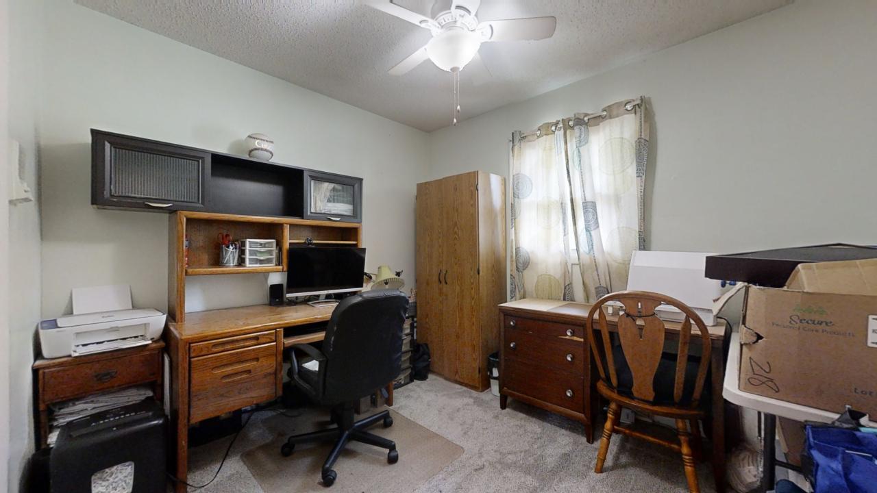 3656 North Meadowlark Drive Decatur, IL 62526 - Photo 15 of 31 a workspace with furniture and window