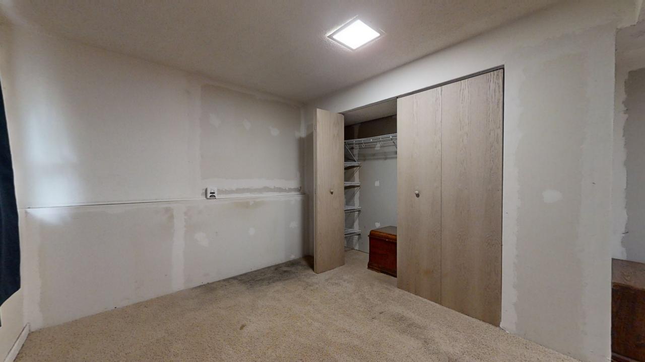 3656 North Meadowlark Drive Decatur, IL 62526 - Photo 23 of 31 an empty room with closet