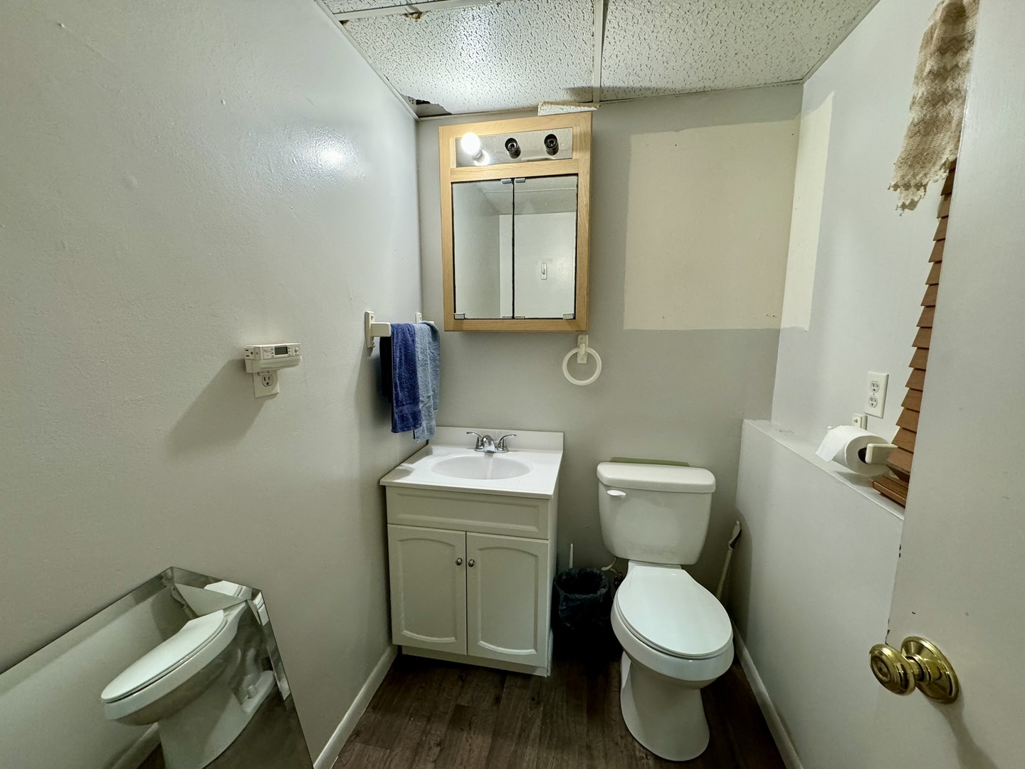 3656 North Meadowlark Drive Decatur, IL 62526 - Photo 26 of 31 a bathroom with a toilet sink and mirror