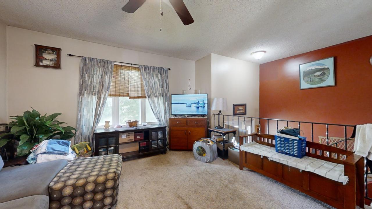 3656 North Meadowlark Drive Decatur, IL 62526 - Photo 5 of 31 a bedroom with furniture and a window