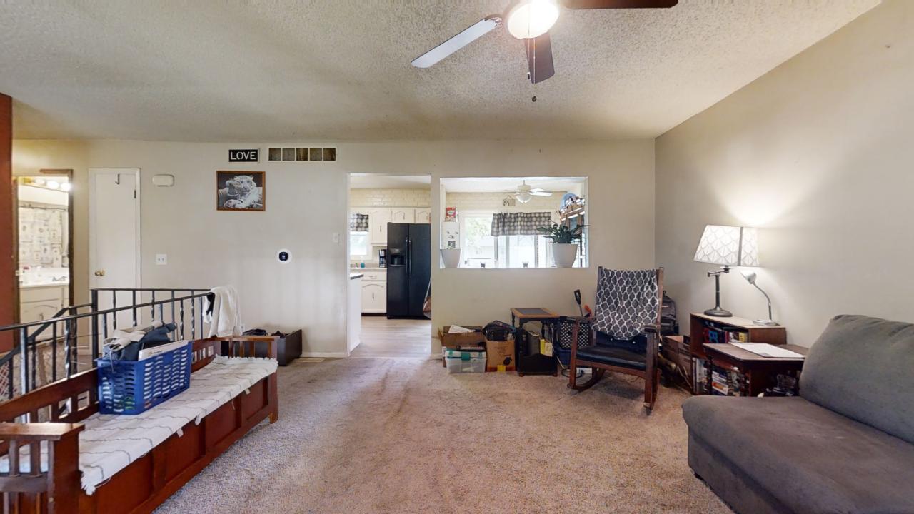 3656 North Meadowlark Drive Decatur, IL 62526 - Photo 6 of 31 a living room with furniture and a window