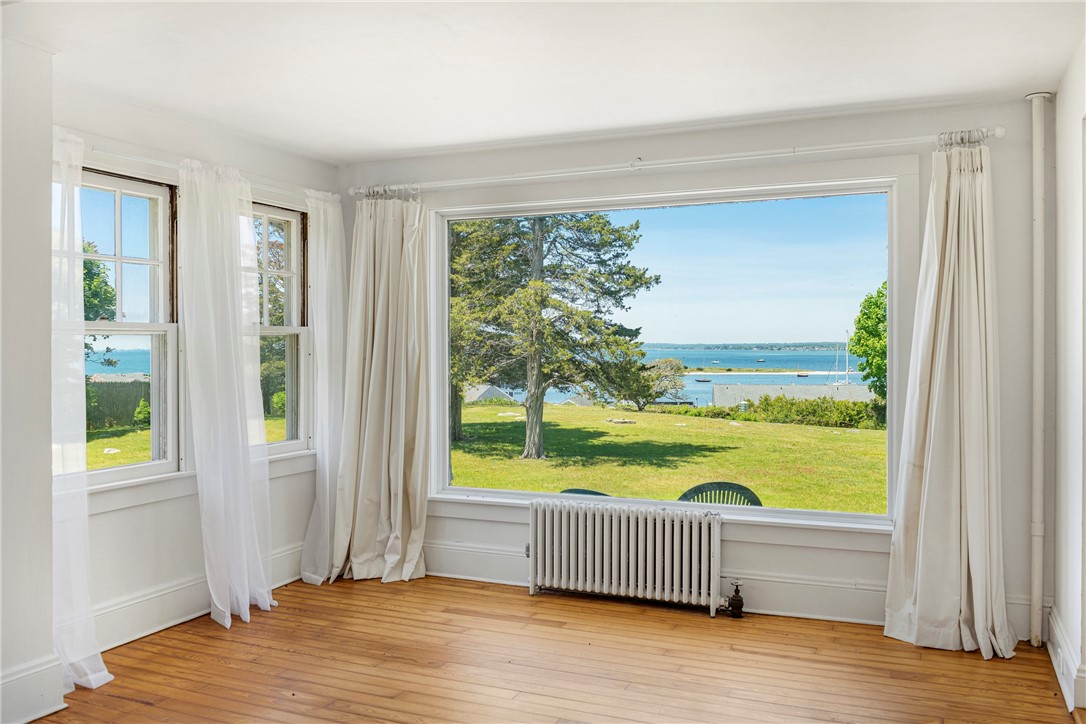 8 Chapel Lane Westerly, RI 02891 - Photo 14 of 22 Actual photo of living room showing gorgeous ocean views.