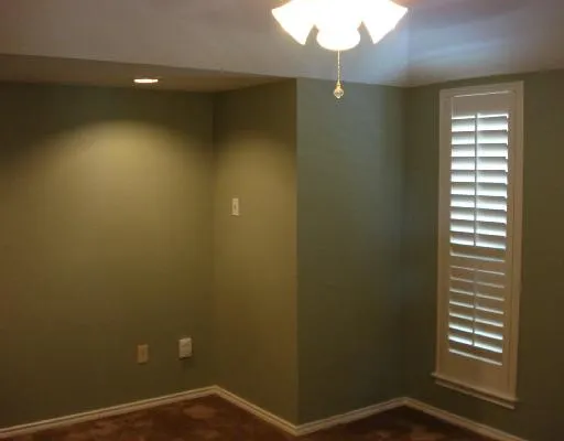 en empty room with a window