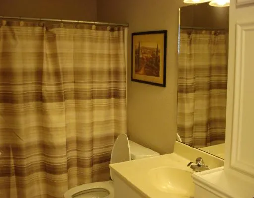 a view of a wooden fence