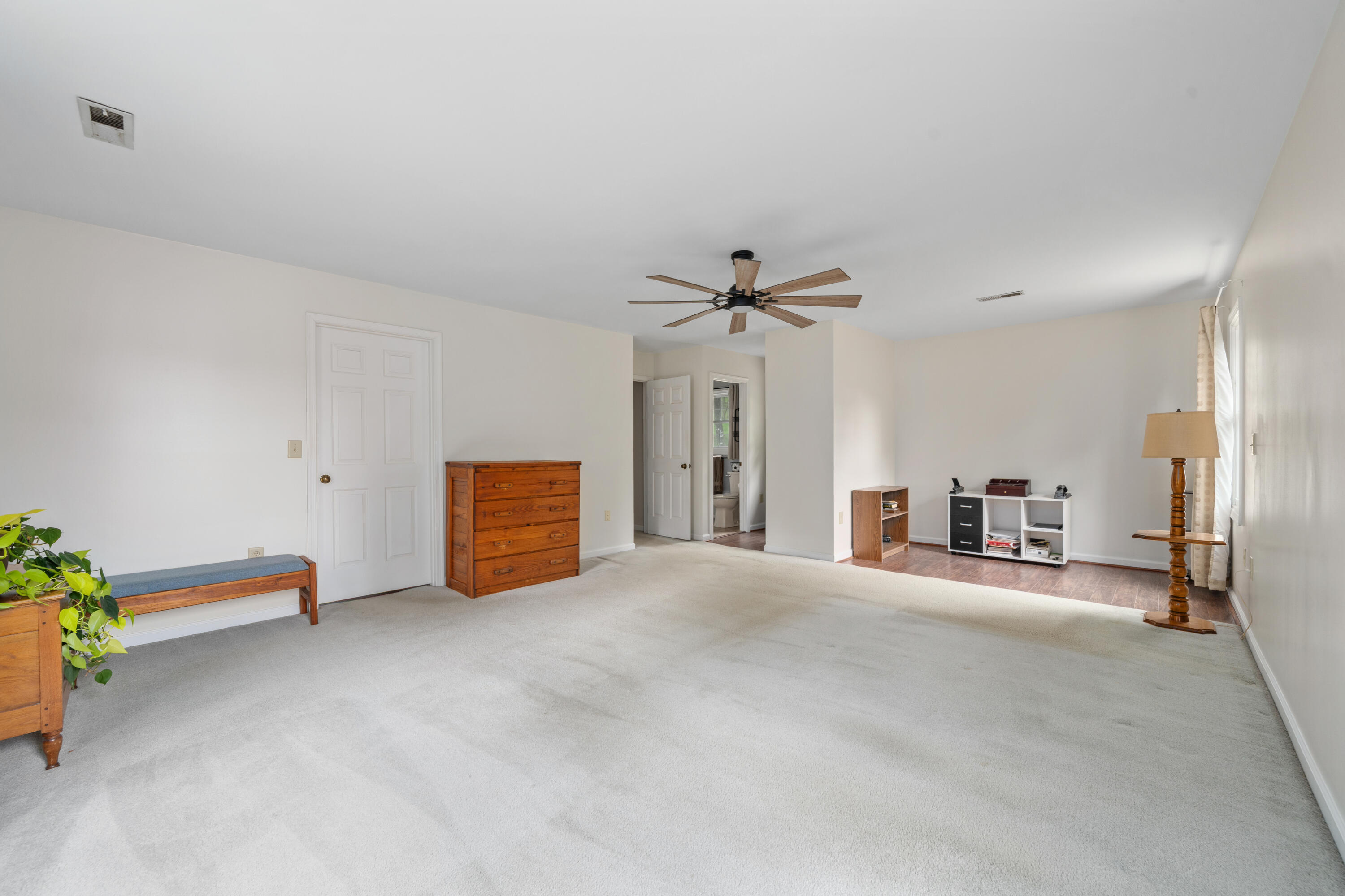 3341 Hidden Oak Road Southwest Roanoke, VA 24018 - Photo 21 of 26 a view of a livingroom with a furniture and ceiling fan