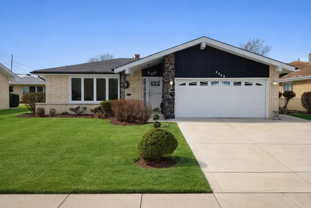 a front view of house with yard