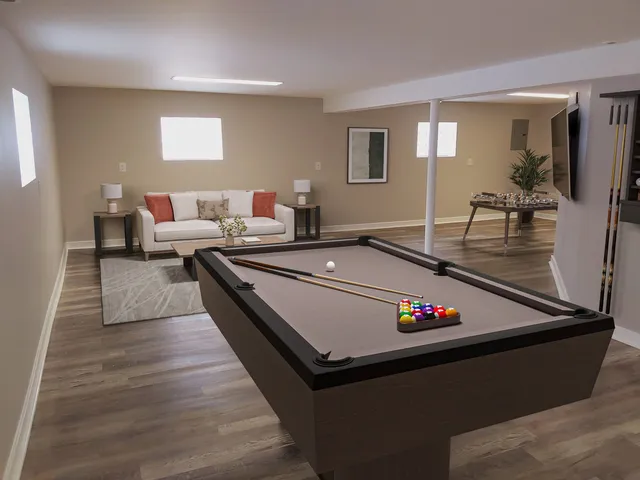 a living room with furniture and a table