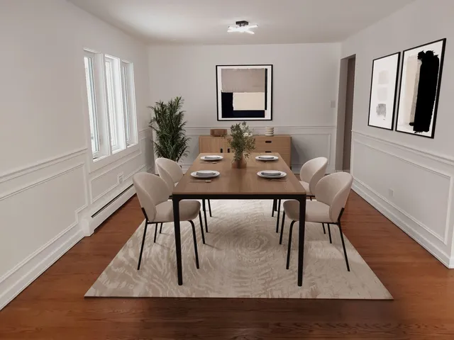 a view of a dining room with furniture and wooden floor