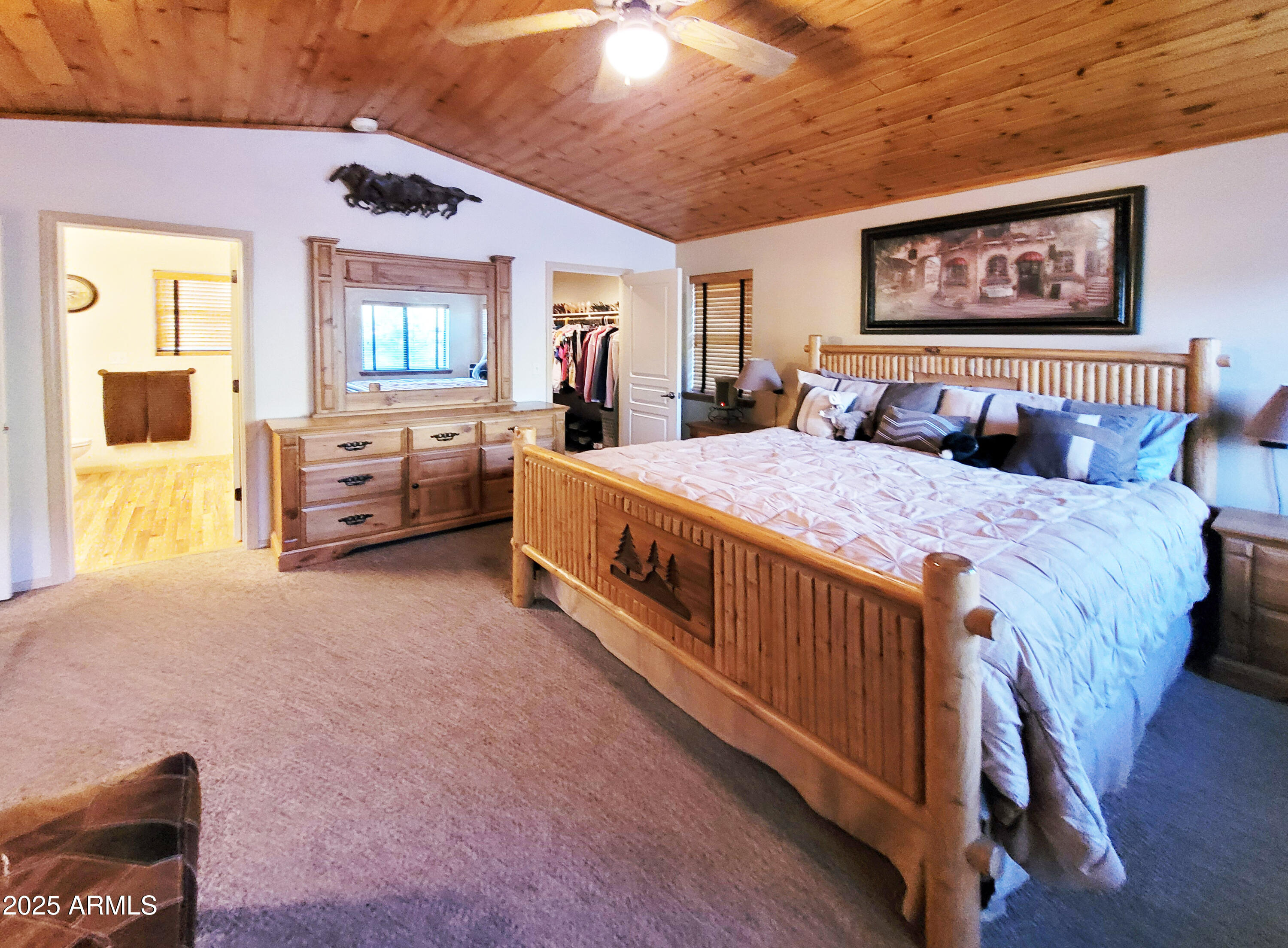 5579 Solitude Trail Loop Pine, AZ 85544 - Photo 29 of 50 a bed room with bed and window