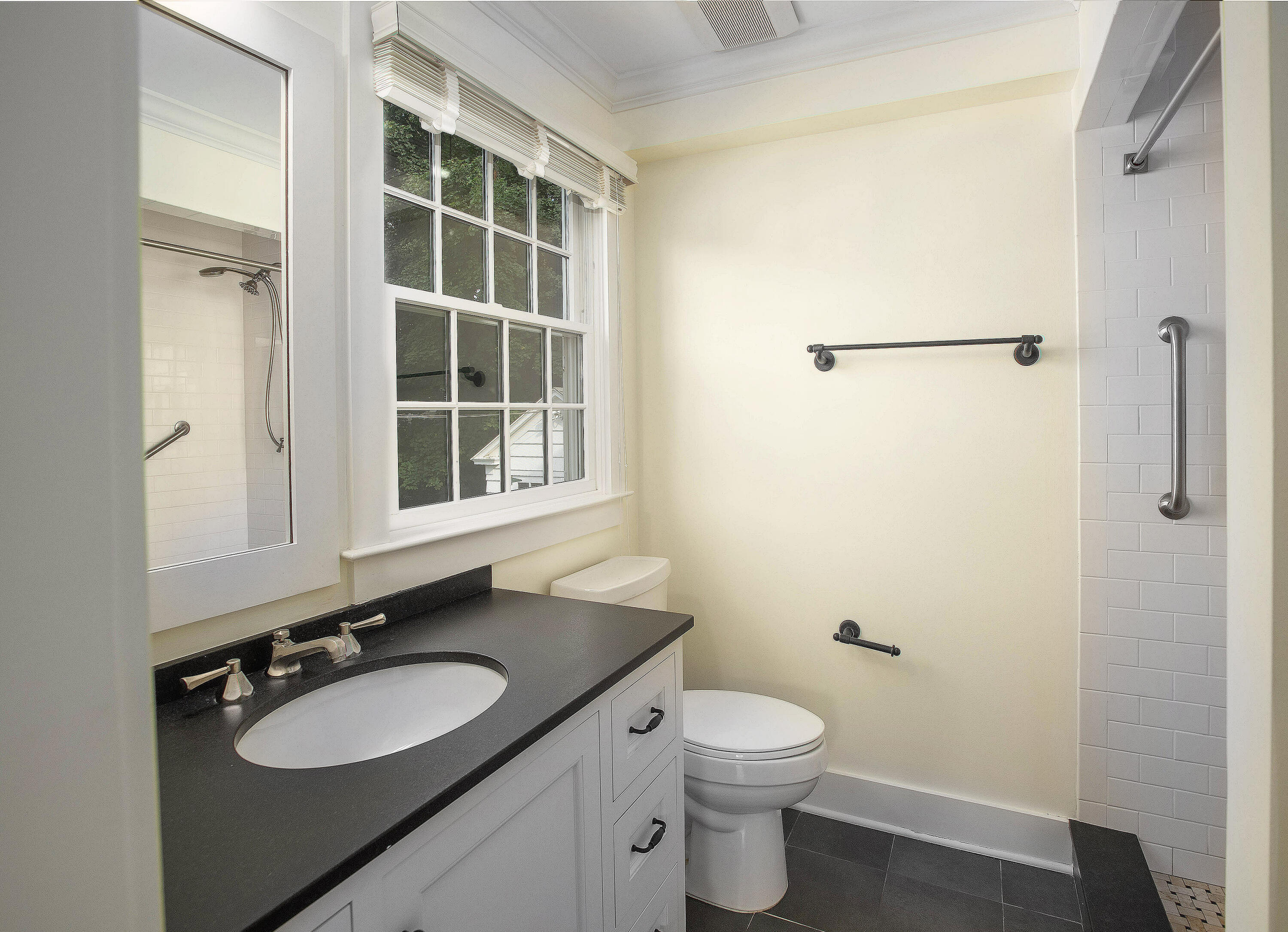 64 Sunrise Avenue New Canaan, CT 06840 - Photo 18 of 22 a bathroom with a granite countertop sink toilet and a mirror