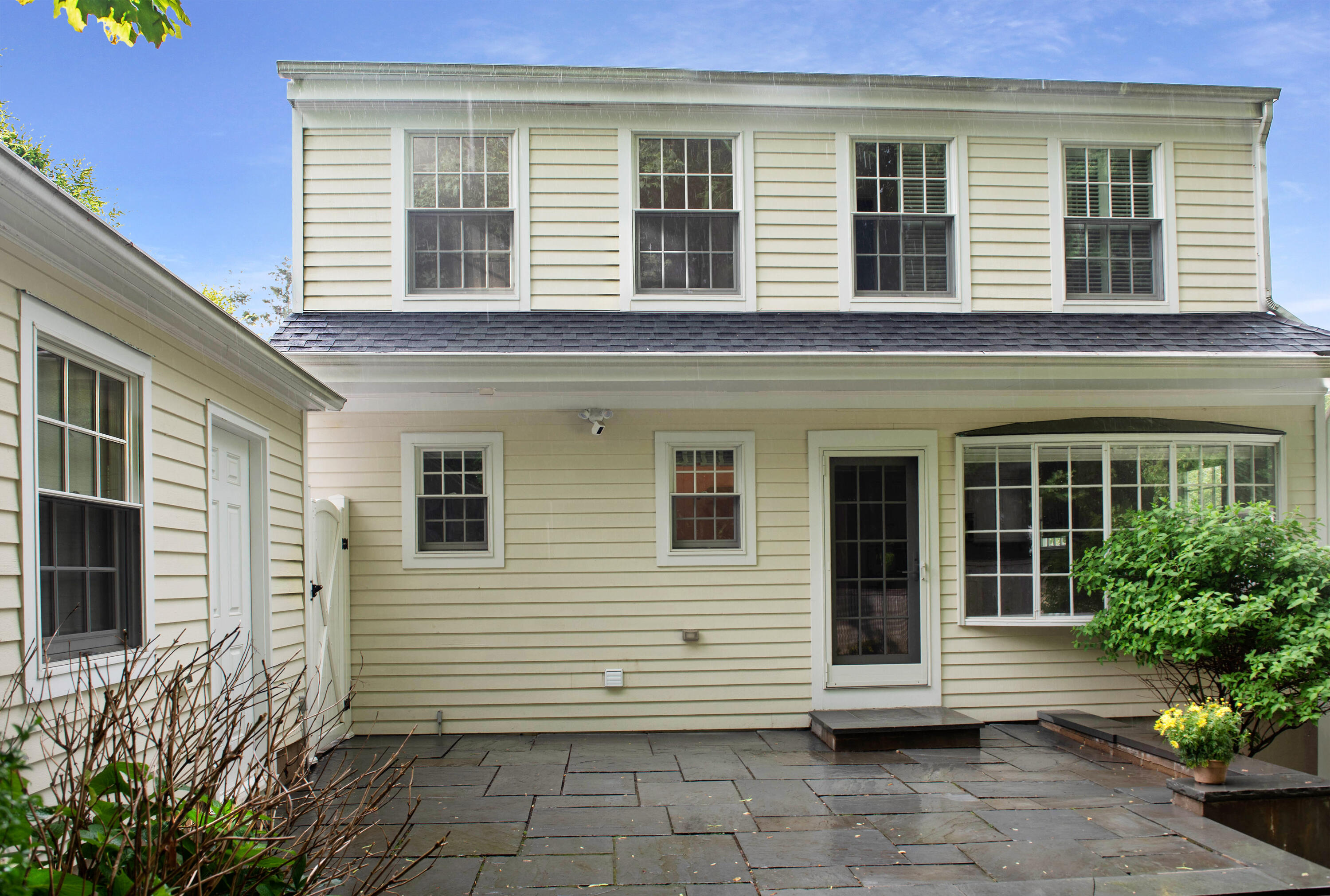 64 Sunrise Avenue New Canaan, CT 06840 - Photo 20 of 22 a view of a house with a window and stairs