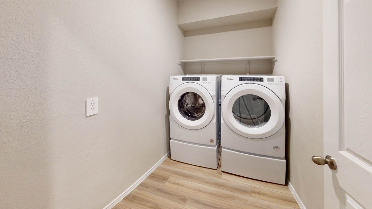 561 Hector Loop Georgetown, TX 78626 - Photo 29 of 30 a utility room with dryer and washer