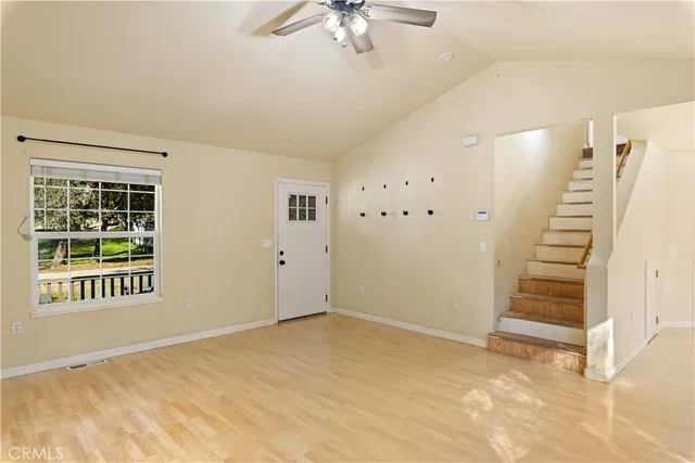 a view of an empty room with a window