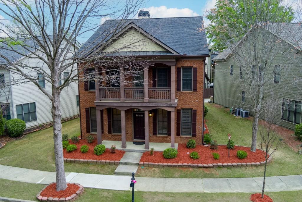 a front view of a house with an outdoor space