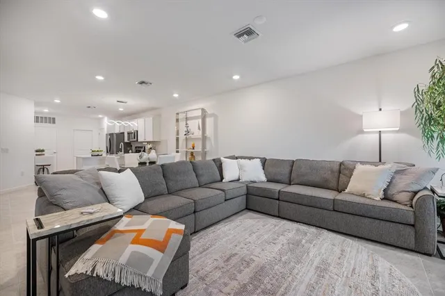 a living room with furniture and a couch