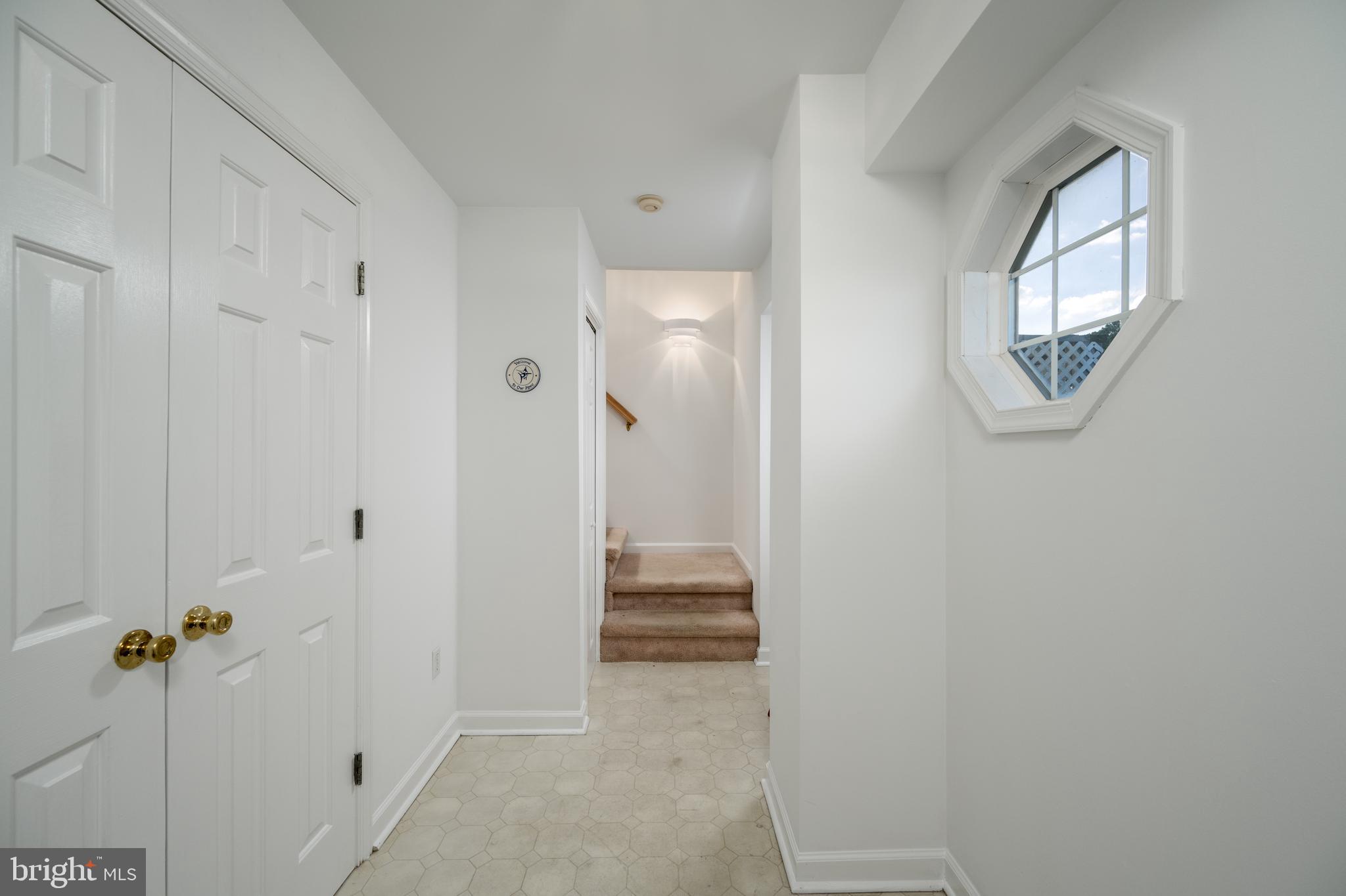 10 Duck Walk Bethany Beach, DE 19930 - Photo 20 of 62 Foyer Up to Stairs of Living Level / Great Room