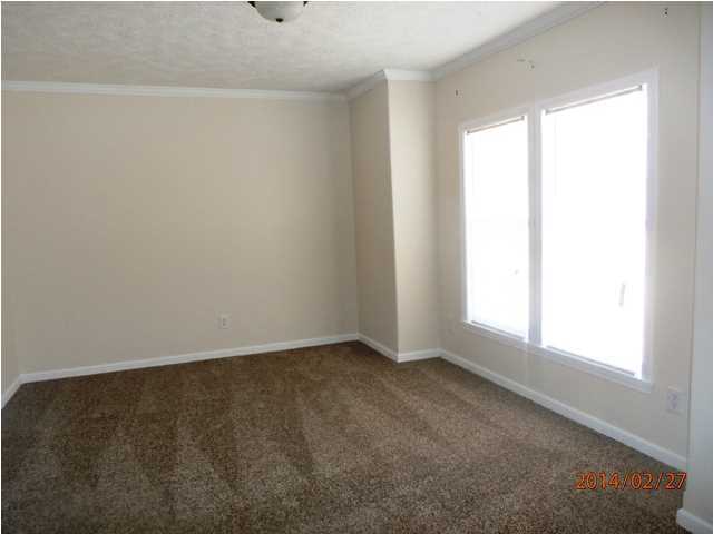 725 Sandy Ramp Road DeFuniak Springs, FL 32433 - Photo 14 of 20 an empty room with a window