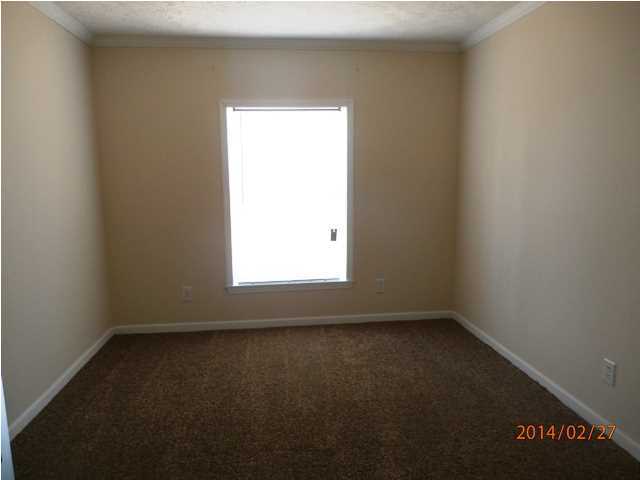 725 Sandy Ramp Road DeFuniak Springs, FL 32433 - Photo 15 of 20 an empty room with a window