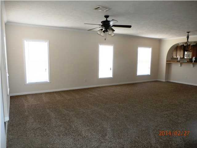 725 Sandy Ramp Road DeFuniak Springs, FL 32433 - Photo 5 of 20 a view of empty room with window