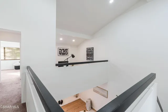 a bedroom with furniture and a bed