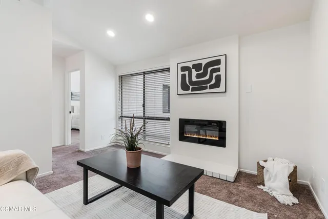 a bed room with a bed and a window