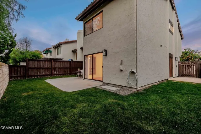a view of a back yard of the house
