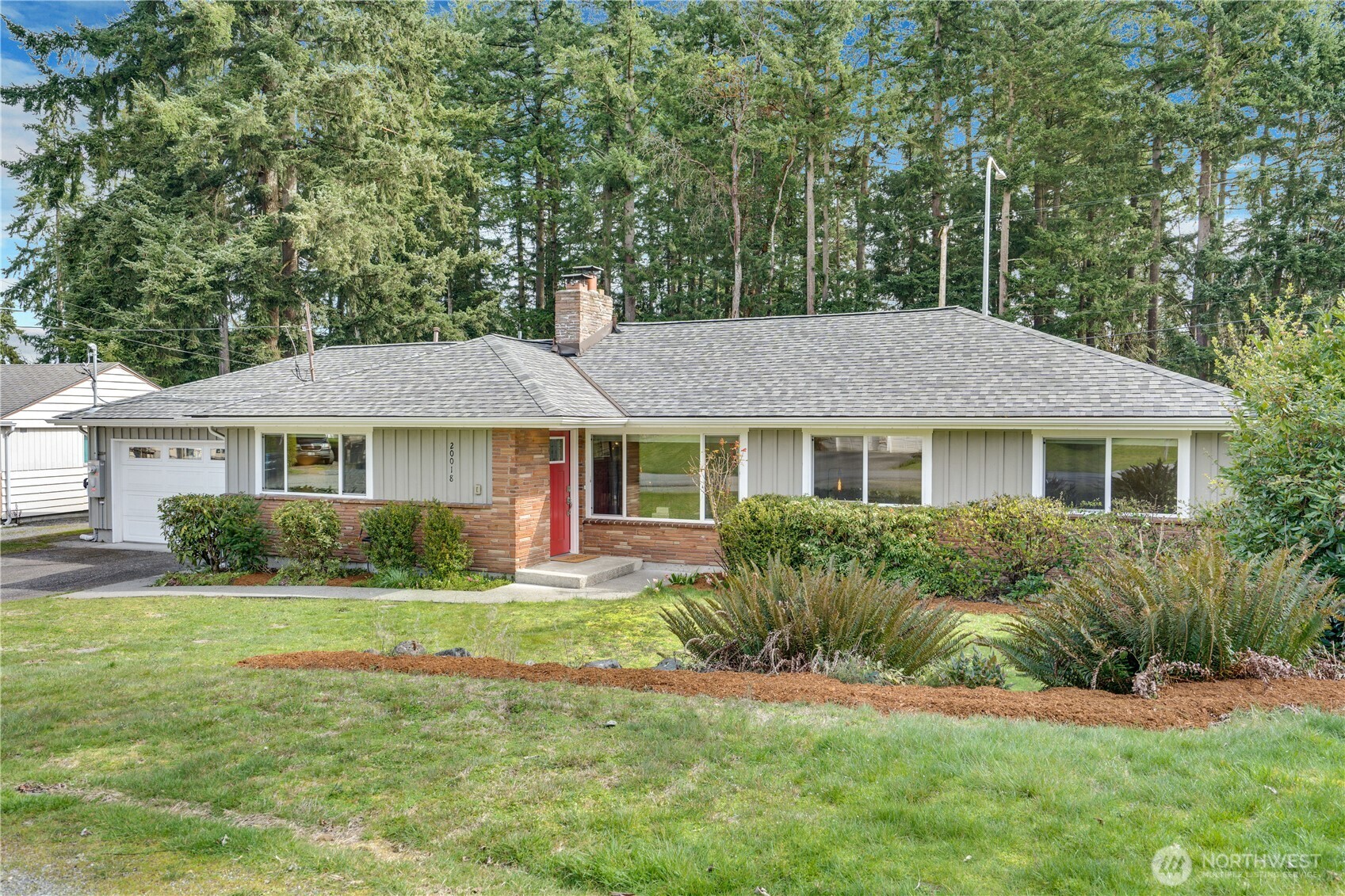 20018 Meridian Place North Shoreline, WA 98133 - Photo 1 of 37 a front view of a house with a yard