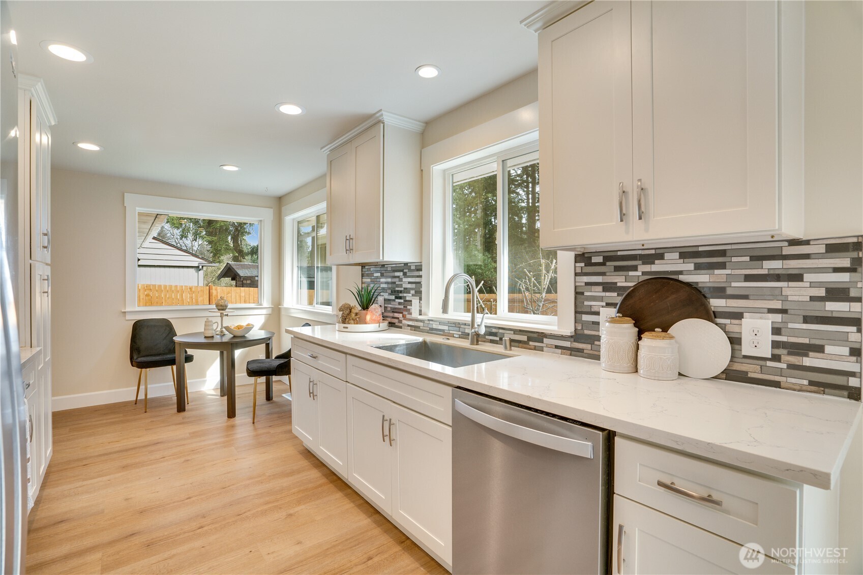 20018 Meridian Place North Shoreline, WA 98133 - Photo 11 of 37 a kitchen with lots of counter top space and living room