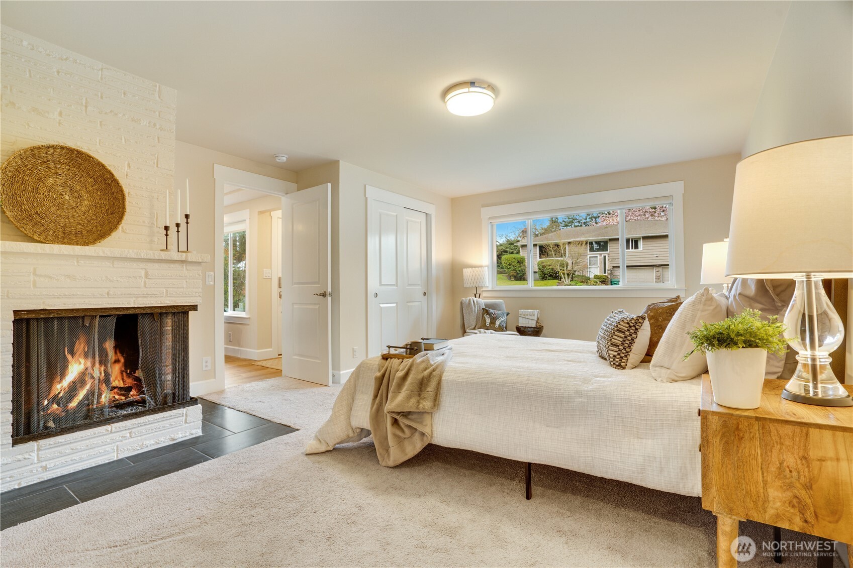 20018 Meridian Place North Shoreline, WA 98133 - Photo 18 of 37 a bedroom with a bed and a fireplace