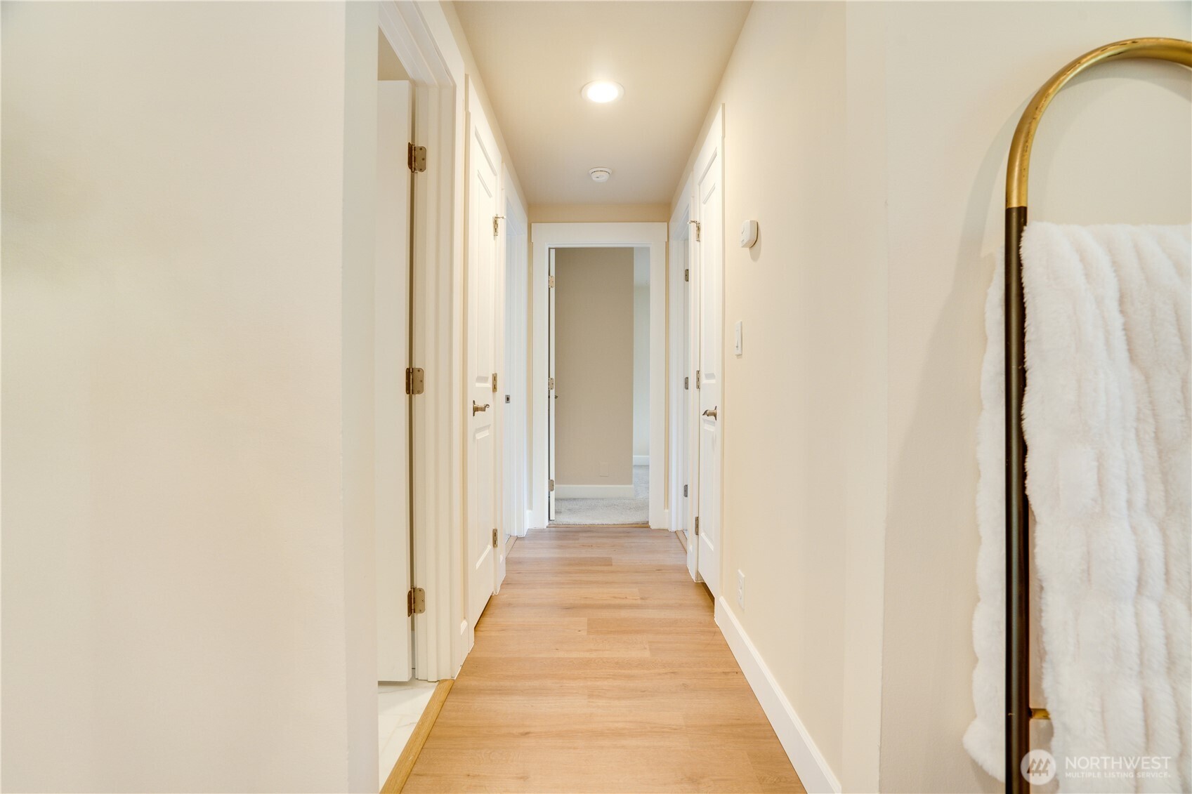 20018 Meridian Place North Shoreline, WA 98133 - Photo 22 of 37 a view of a hallway with wooden floor