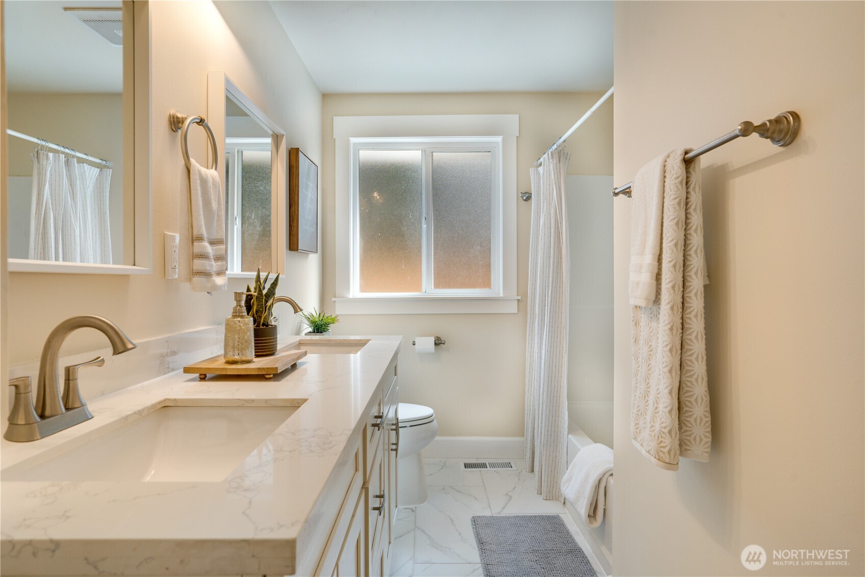 20018 Meridian Place North Shoreline, WA 98133 - Photo 24 of 37 a bathroom with a sink and a mirror