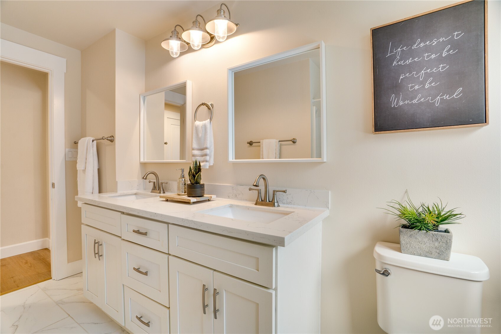 20018 Meridian Place North Shoreline, WA 98133 - Photo 25 of 37 a bathroom with a sink vanity and a mirror