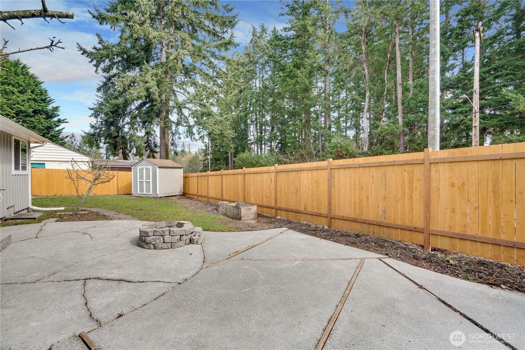 20018 Meridian Place North Shoreline, WA 98133 - Photo 28 of 37 a backyard of a house with trees and stairs