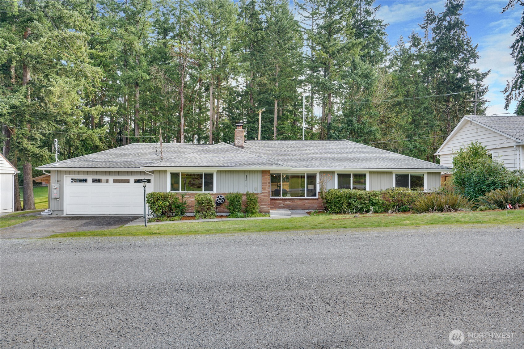 20018 Meridian Place North Shoreline, WA 98133 - Photo 37 of 37 a front view of a house with a yard and trees