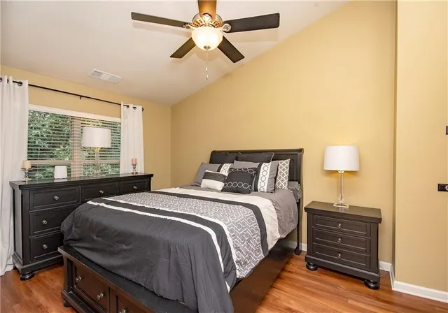 a bedroom with a bed and a closet