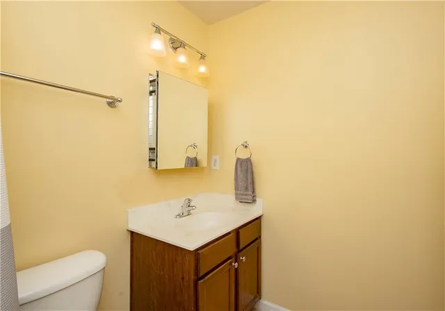 a bathroom with a sink and a toilet