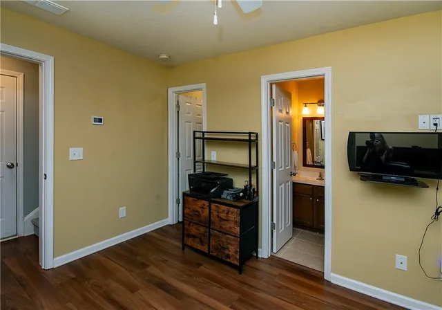 a view of a livingroom with furniture and front door