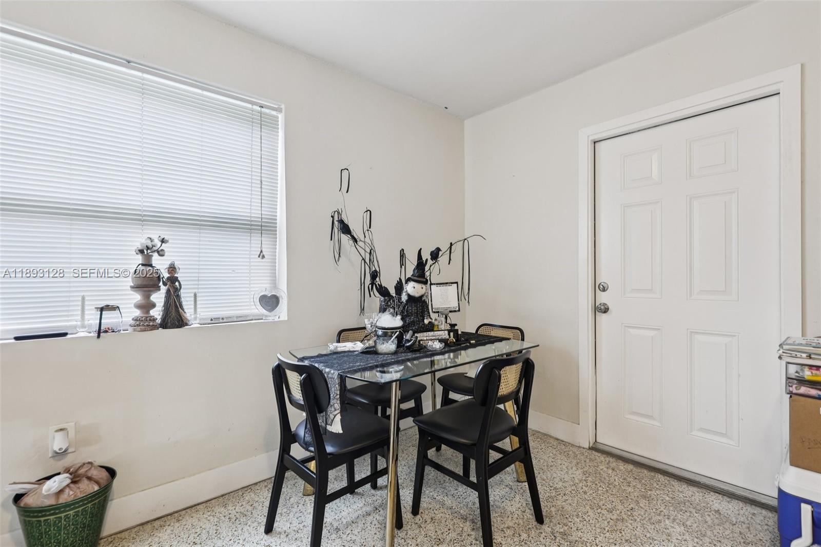 3300 Southwest 9th Terrace Miami, FL 33135 - Photo 18 of 25 a view of a dining room with furniture