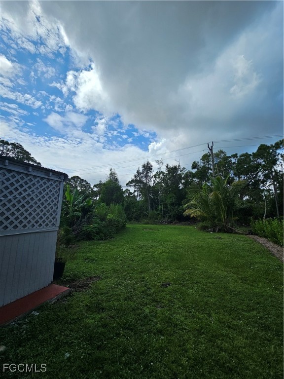 5487 Judith Road Bokeelia, FL 33922 - Photo 18 of 18 a view of a backyard