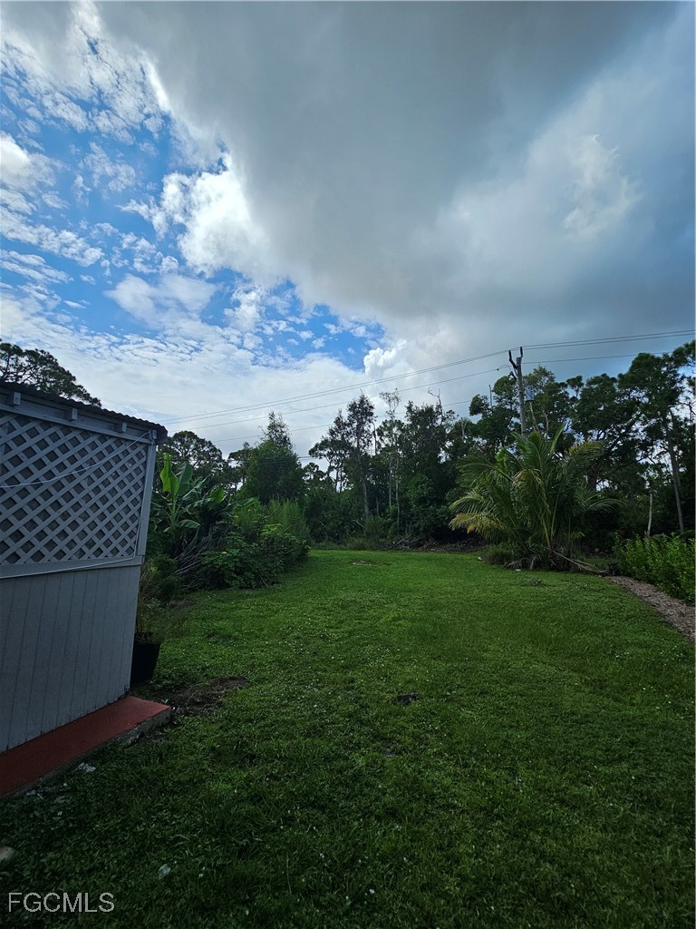 5487 Judith Road Bokeelia, FL 33922 - Photo 18 of 18 a view of a backyard