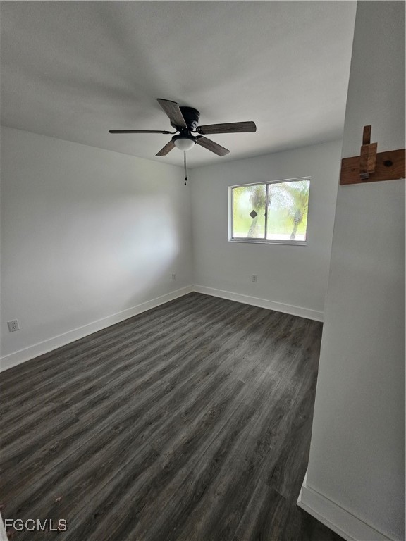 5487 Judith Road Bokeelia, FL 33922 - Photo 6 of 18 wooden floor in an empty room