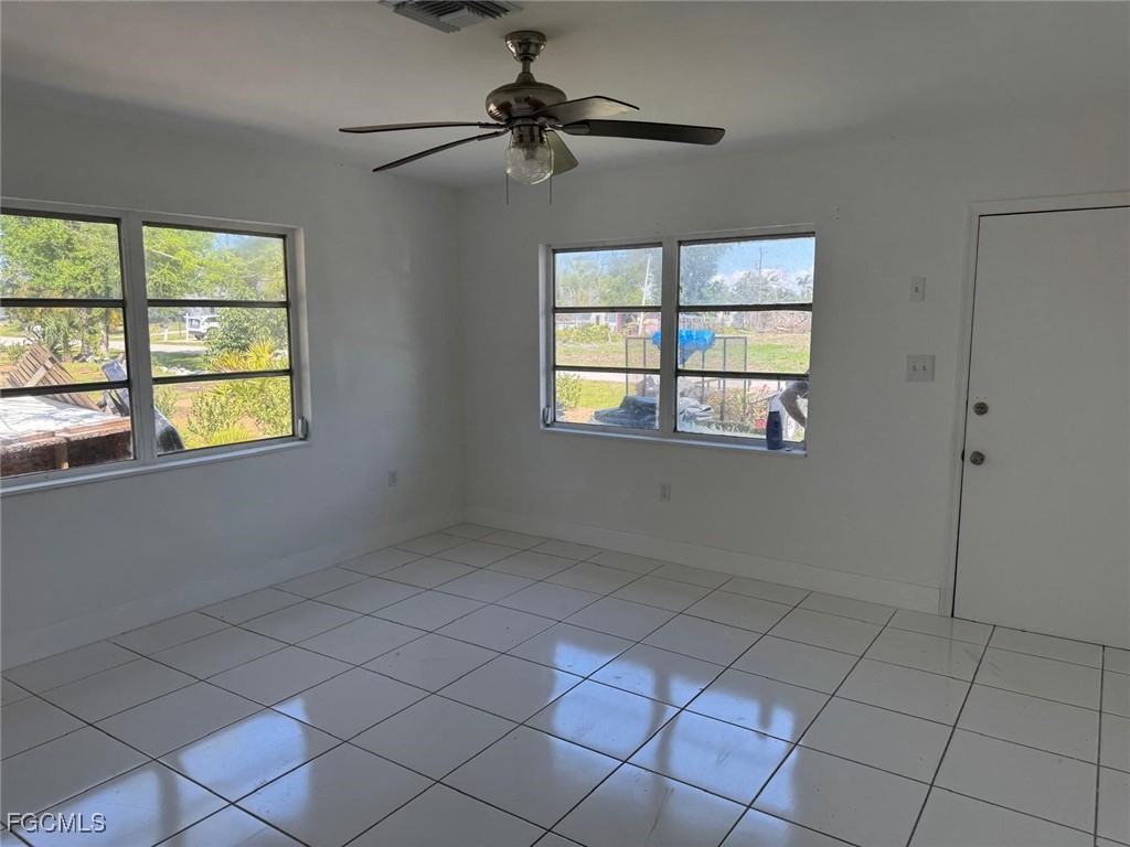 5487 Judith Road Bokeelia, FL 33922 - Photo 9 of 18 a view of an empty room with a window