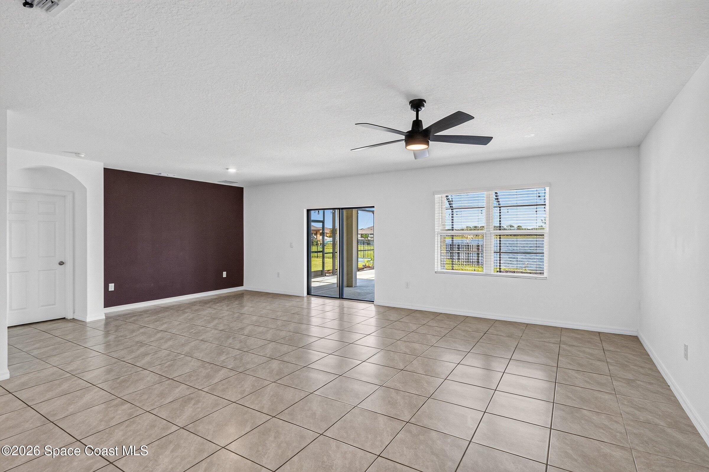 3419 Foggy Mist Road Southeast Palm Bay, FL 32909 - Photo 17 of 39 Living/Dining