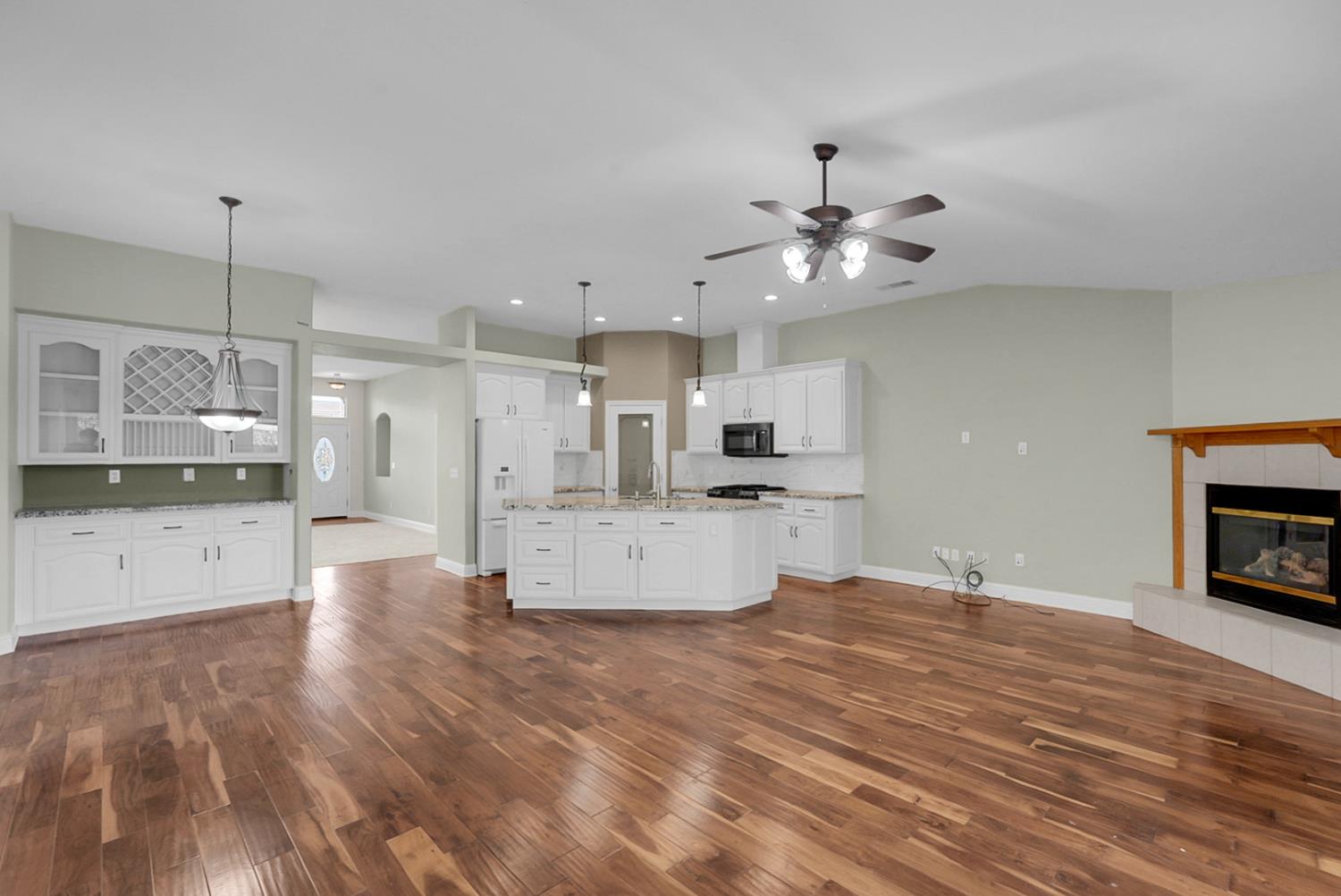 1163 Bailey Drive Ripon, CA 95366 - Photo 10 of 37 Warm and inviting family room with cozy fireplace.