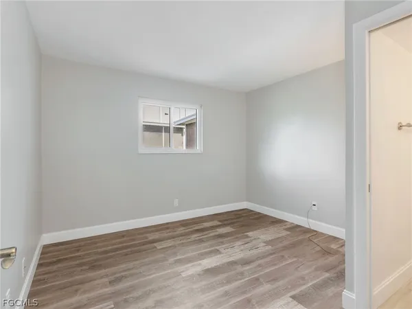 a view of a room that has a window in it