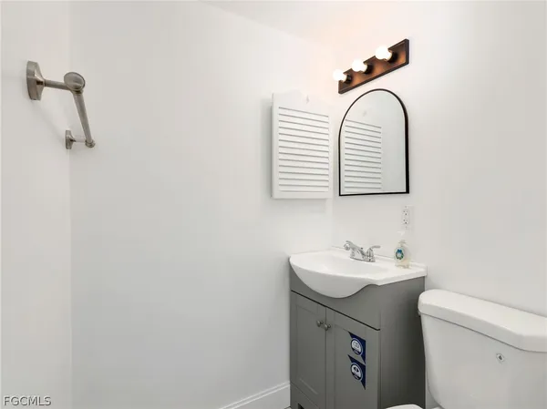 a bathroom with a sink and a toilet