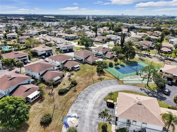 an aerial view of a city with lots of residential buildings